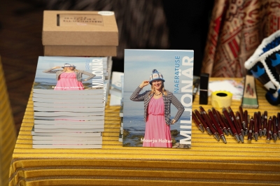 Raamat "Naeratuse Miljonär"